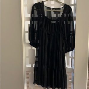 A black classy mid length dress